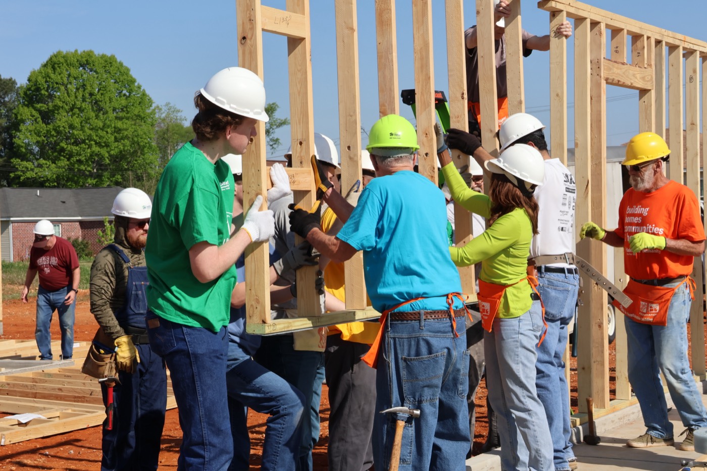 Volunteers working on floor framing